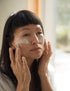 Woman applying Face Mask | Hydrate and Restore