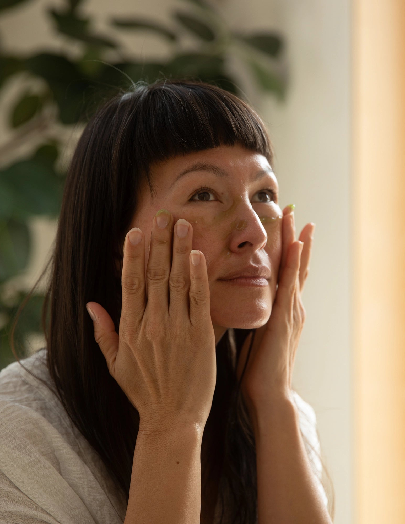 woman applying Face Mask | Soothe & Nourish
