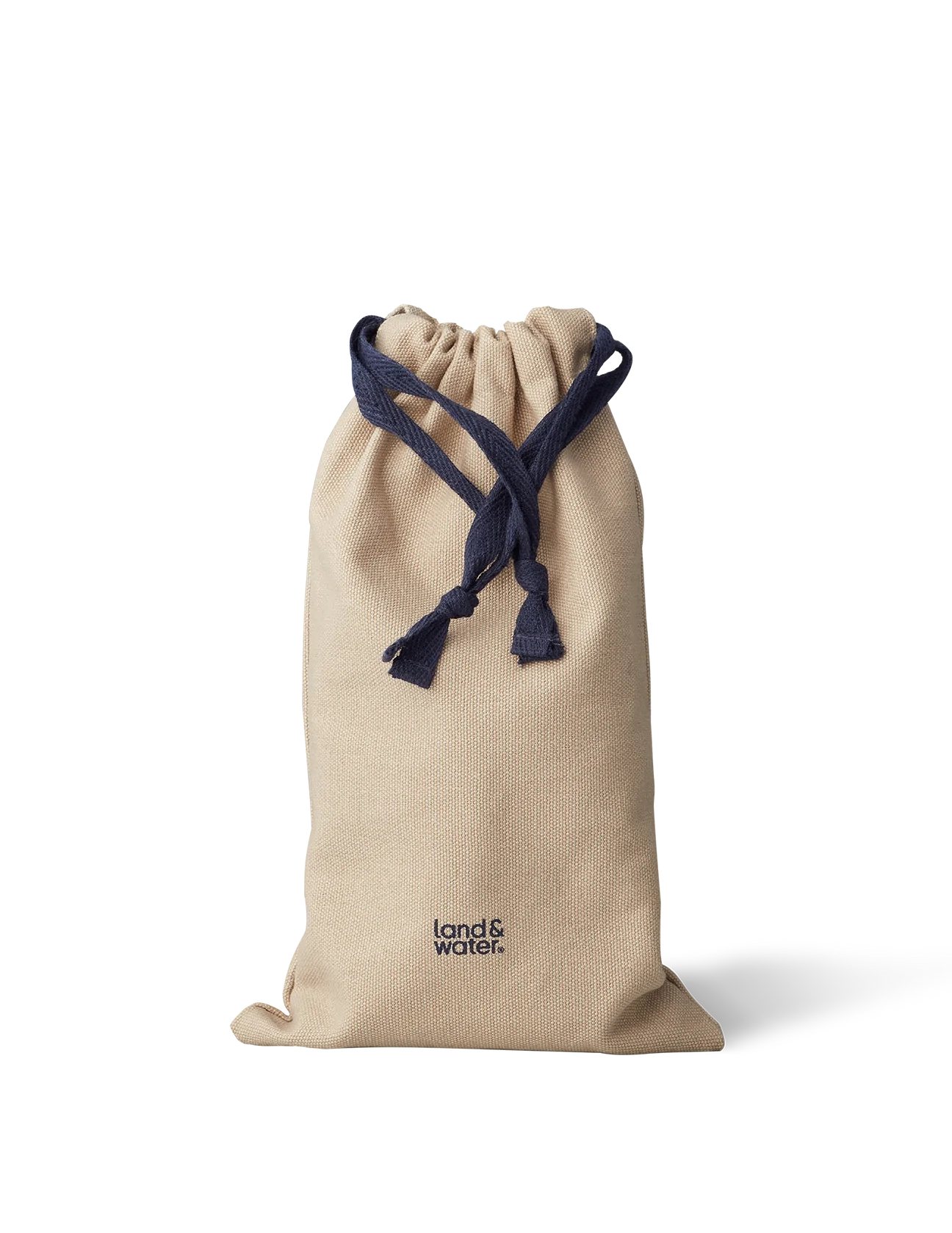 A beige drawstring bag with navy blue drawstrings. Branded land&water.