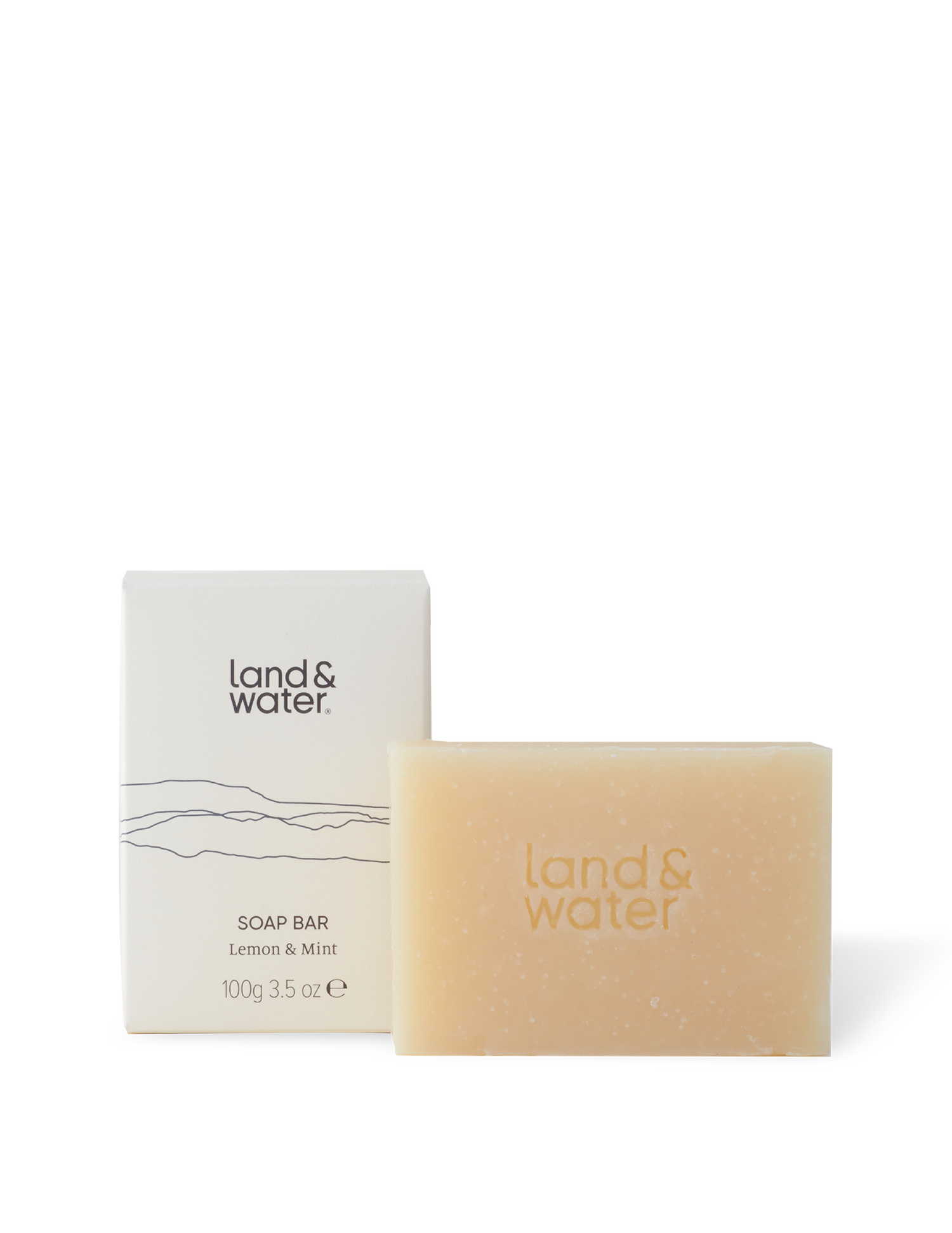 100g soap bar with embossed logo next to its printed box