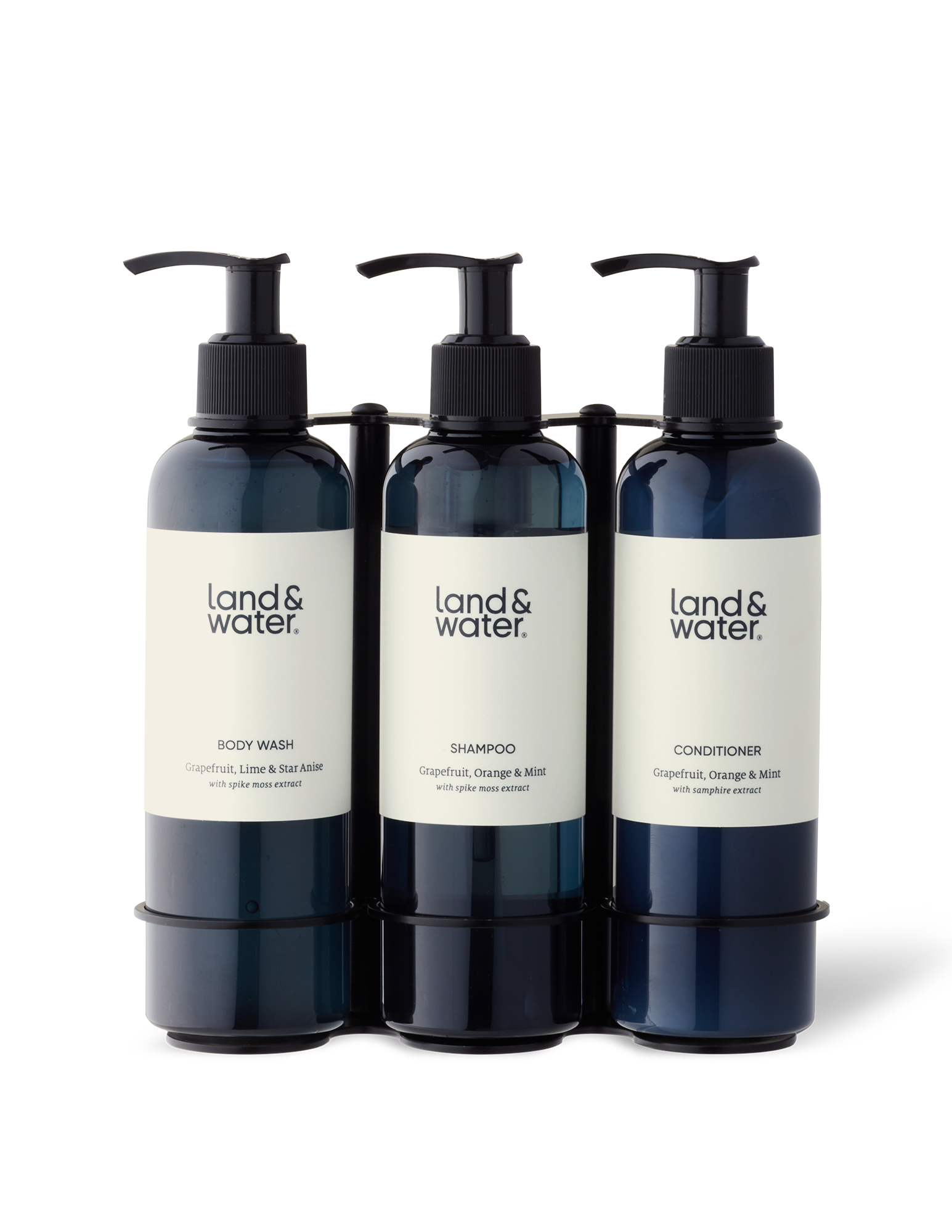 Three bottles in a black stainless steel wall-mounted bracket.
