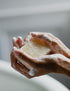 Lathered up land&water soap in a woman&